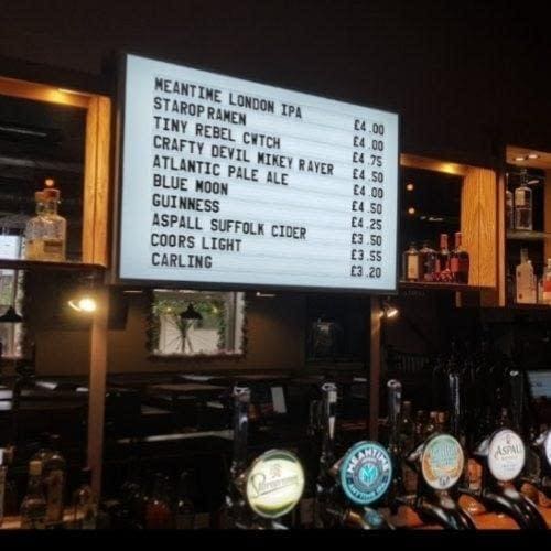 illuminated beer menu board with changeable letters